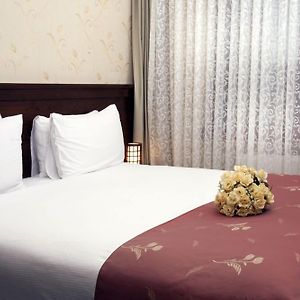 Kamer met een Queen Size Bed